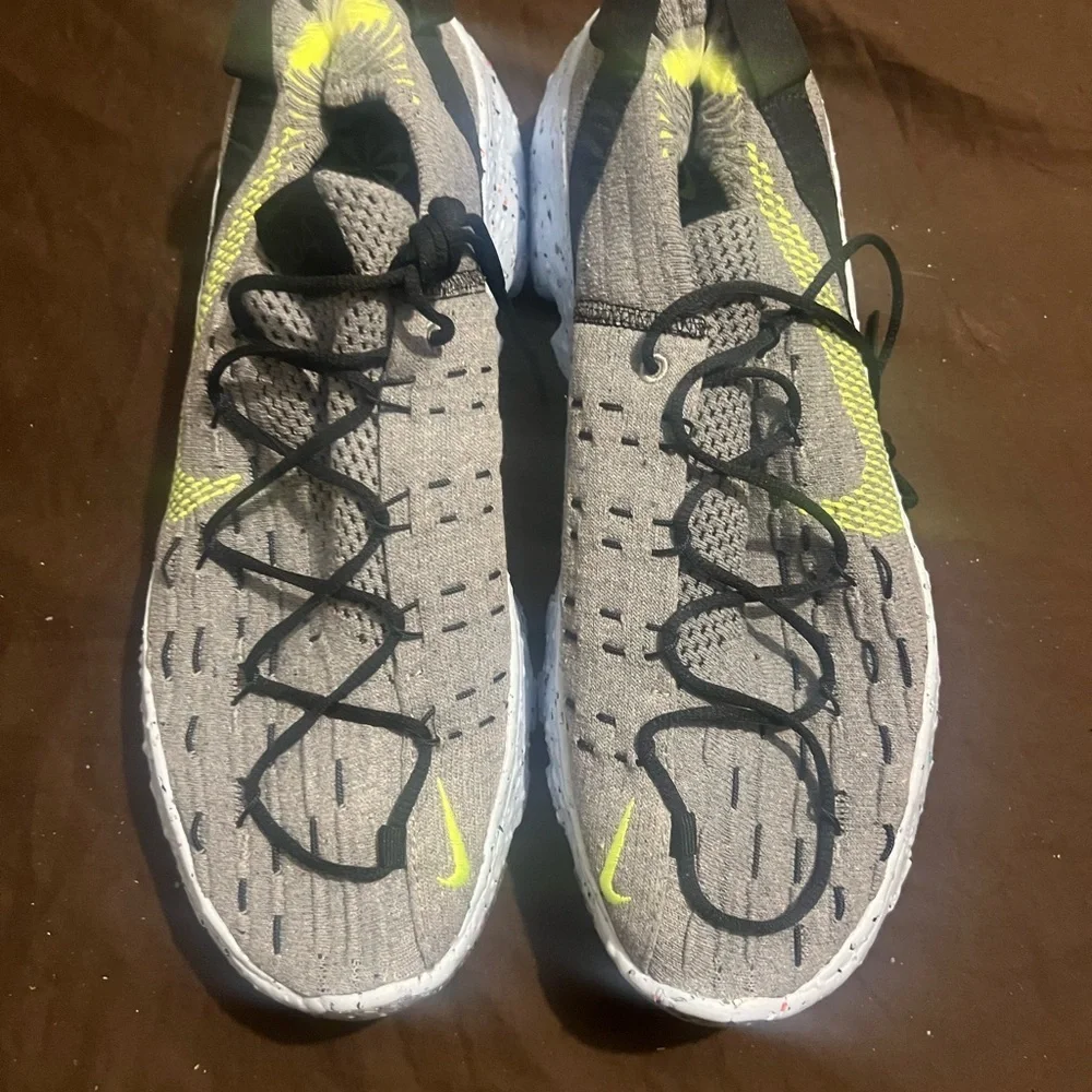 Gray and Yellow Athletic Sneaker Nike Space Hippie fits men size 12.5